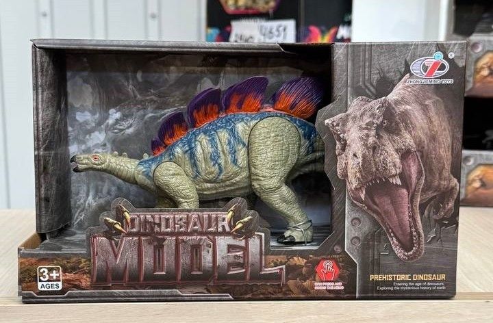 Фигурка Стегозавр, движущийся красно-зеленый Dino Toys (55125) 2986096055125 фото