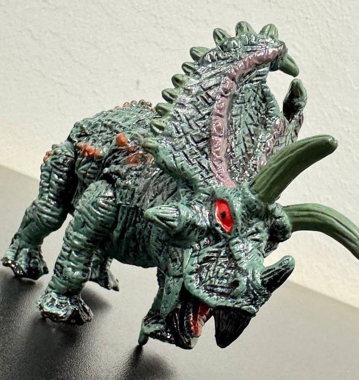 Фігурка Динозавра темно кричневий з червоним Dino Toys (56733) 2986096056733 фото
