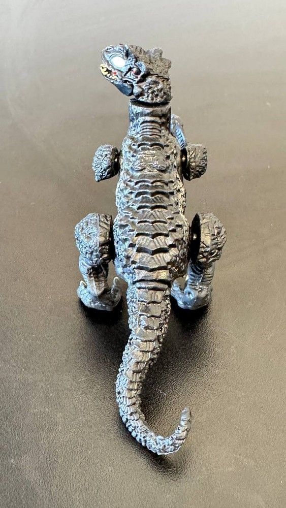 Фігурка Тиранозавр фіолетово-жовтий 29х18,5х11,5см, Dino Toys (56573) 2986096056573 фото